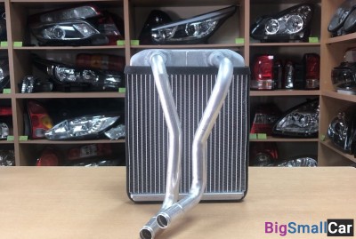 Радиатор печи Kia Spectra склад16